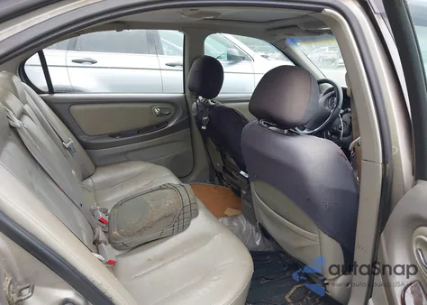 2001 Nissan Maxima Gle from USA, damaged, VIN JN1CA31D61T830594